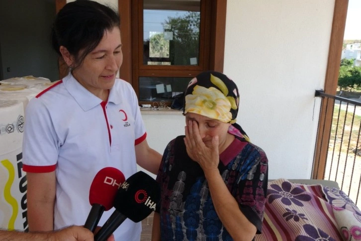 Antalya'da yeni evine kavuşan yangınzedenin sevinç gözyaşları