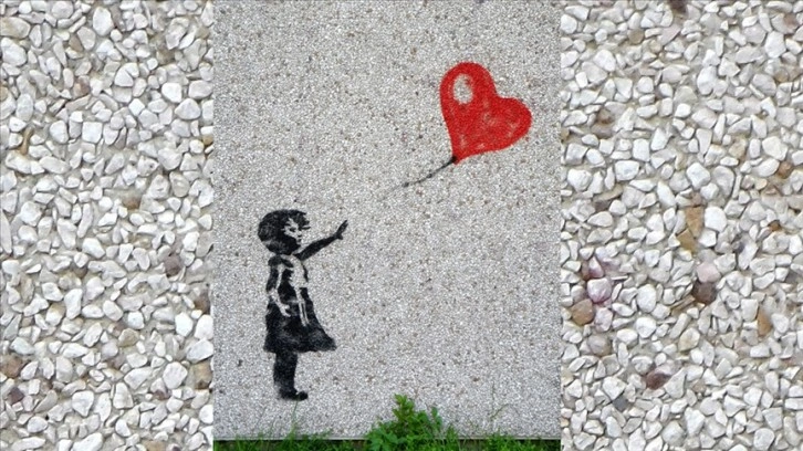 İngiliz çıkmaz sanatçısı Banksy'nin parçalanan yapıtı 18,5 milyon sterline satıldı